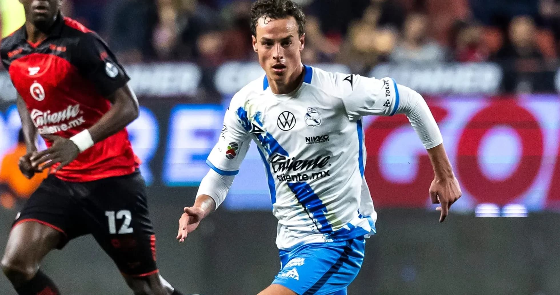 Player from Puebla dribbling during Liga MX match