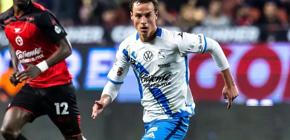 Player from Puebla dribbling during Liga MX match