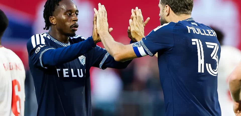 Vancouver FC players celebrating during match