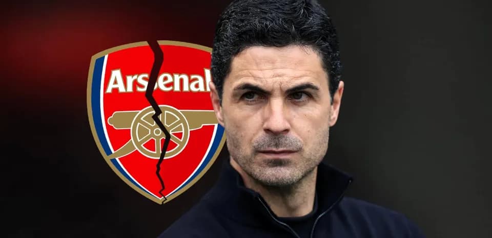 Manager with Arsenal logo in background