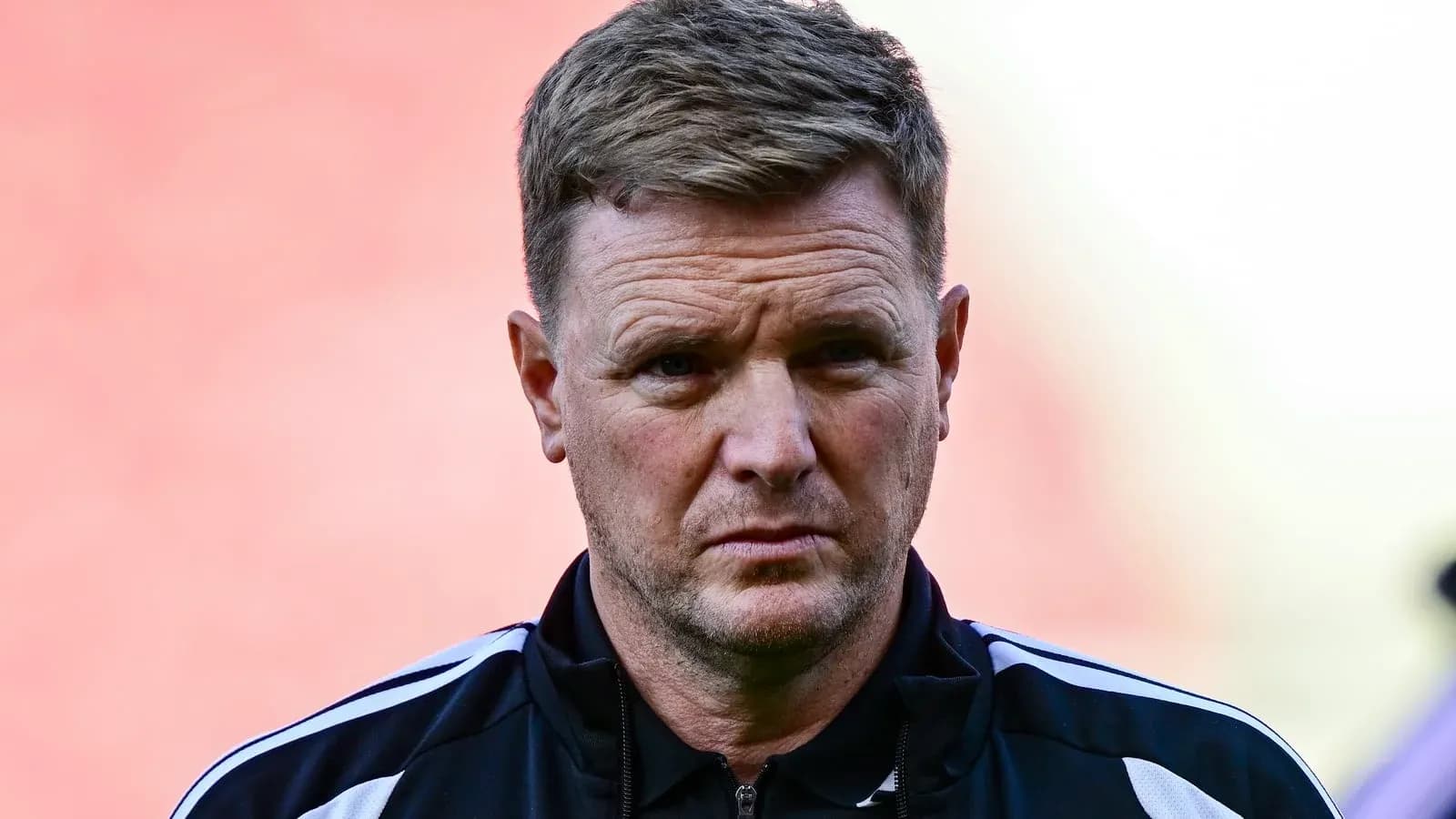 Coach in training gear during match preparation