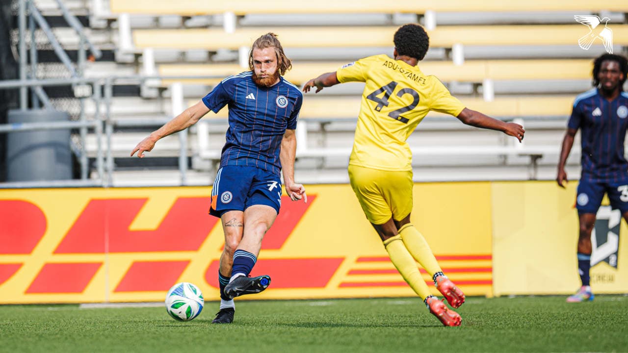 Player passing the ball during NYC II match