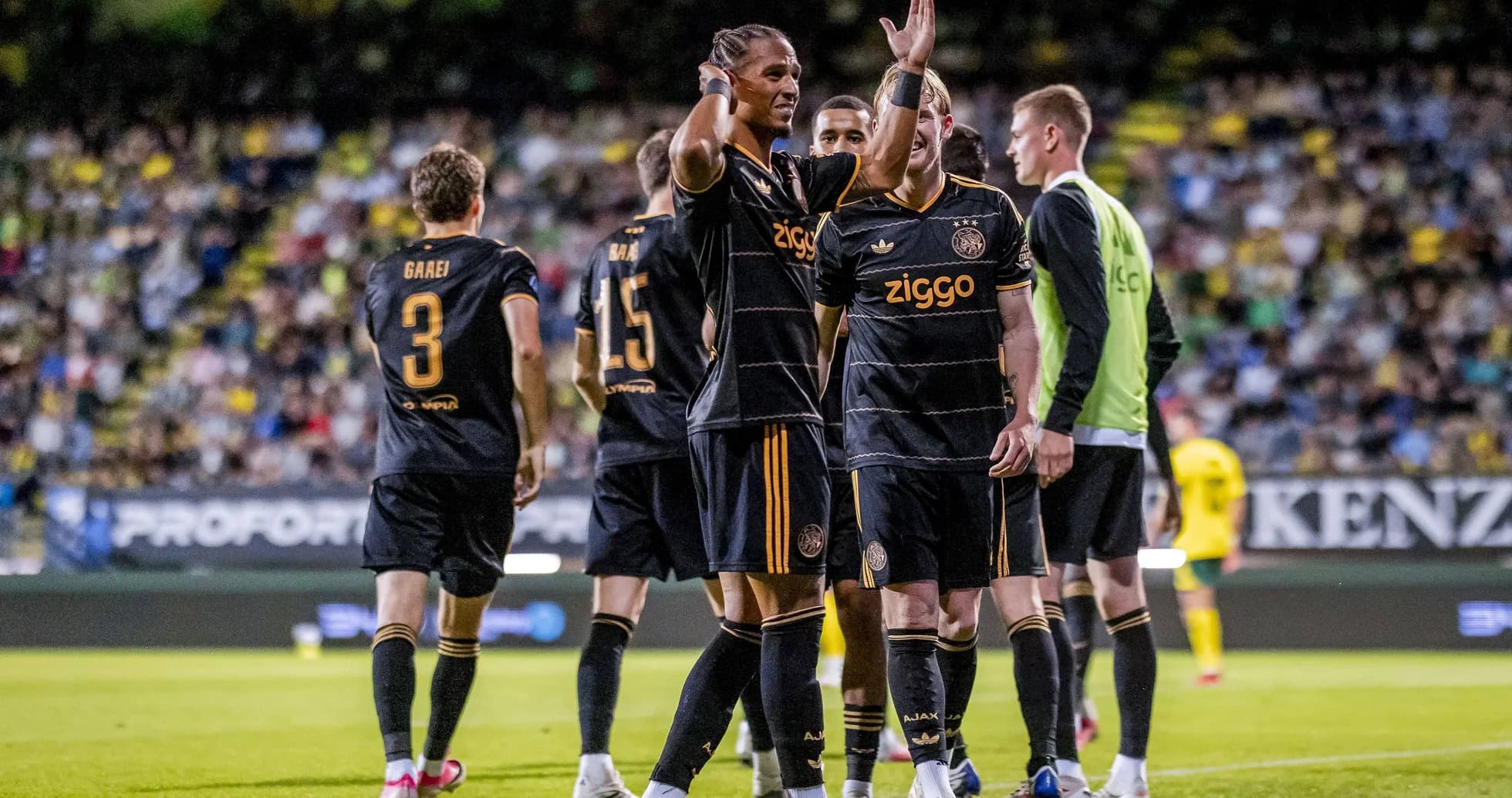 Ajax players celebrating a goal during match