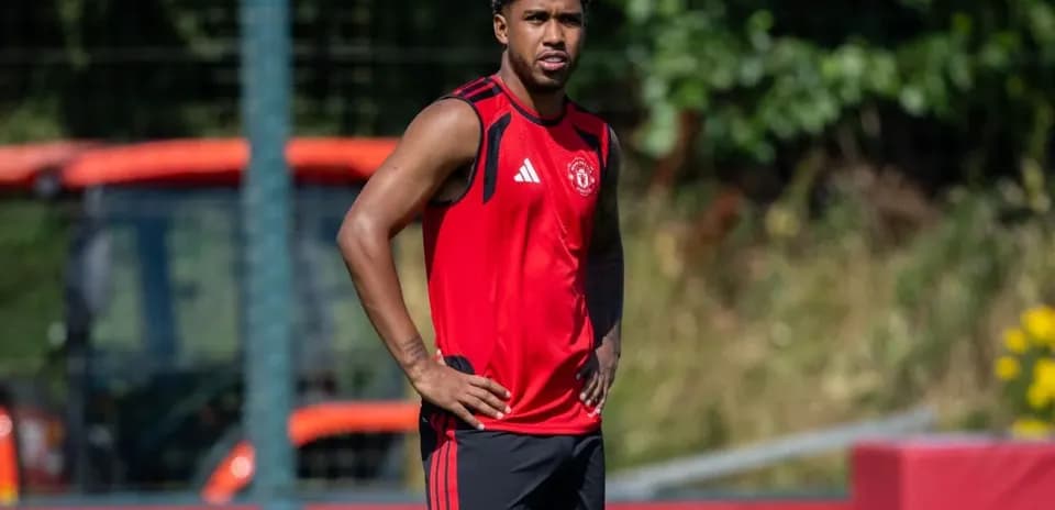 Player in red training kit during practice session