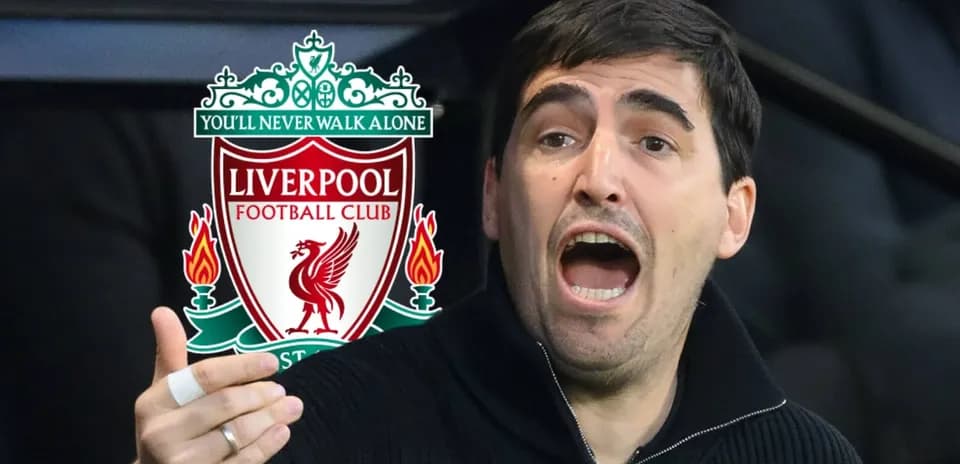 Man gesturing passionately with Liverpool logo in background