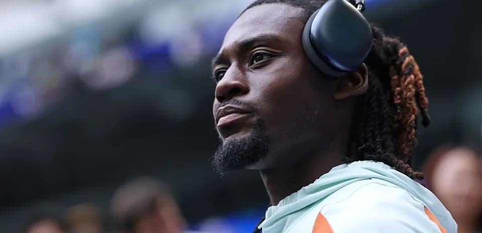 Player wearing headphones before the game