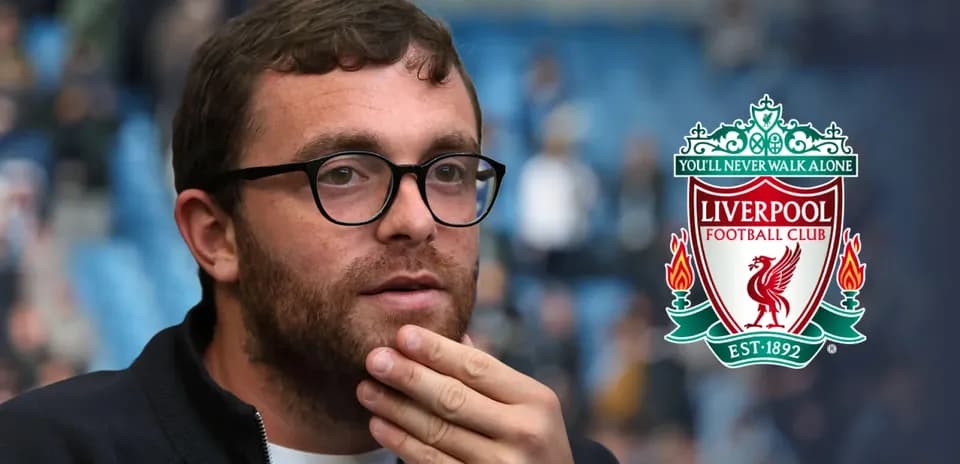 Person with glasses in a football stadium setting