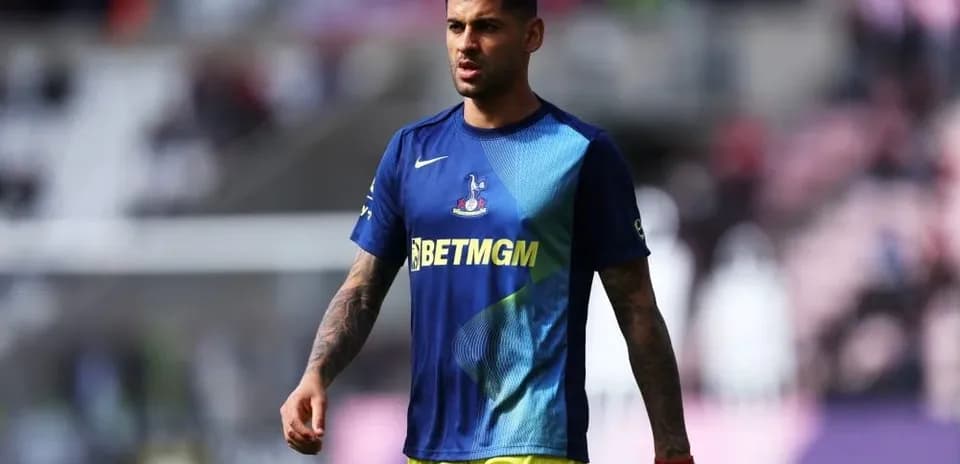 Player walking on the pitch in training gear