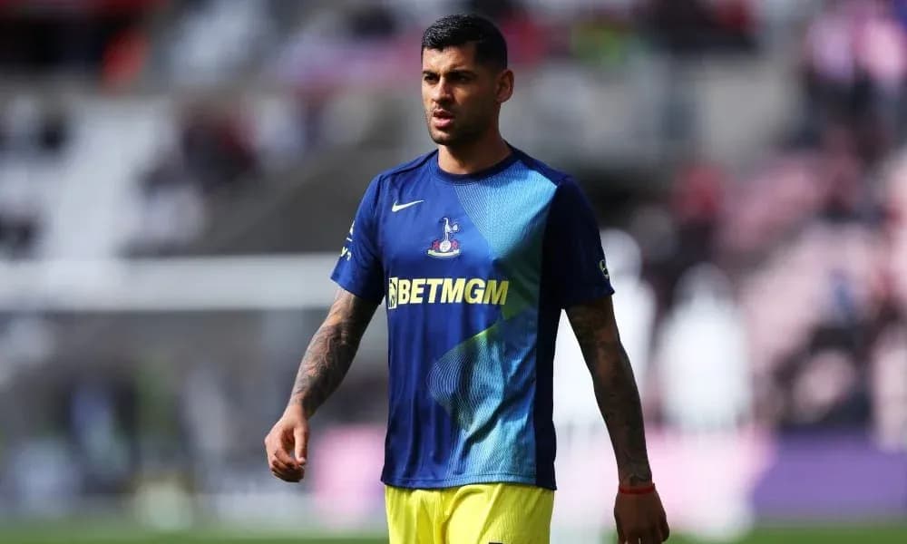 Player walking on the pitch in training gear