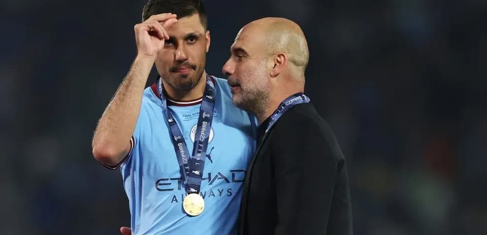 Player and coach celebrating with medals after match