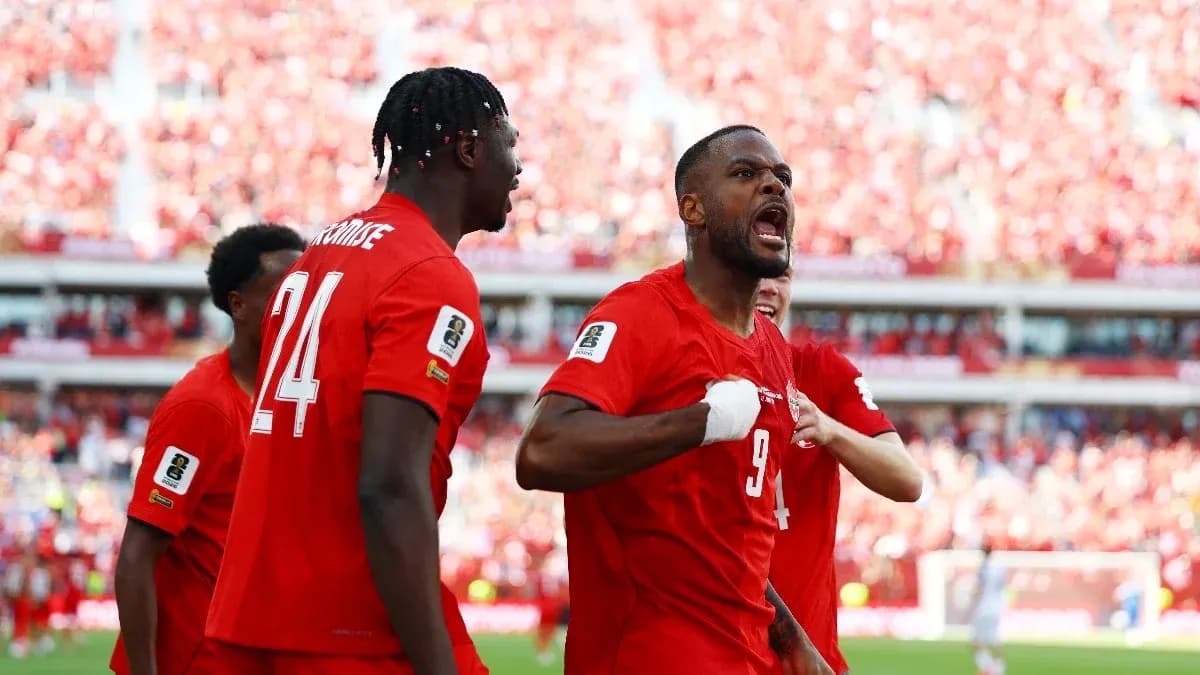 Canadian players celebrating during World Cup qualifying match