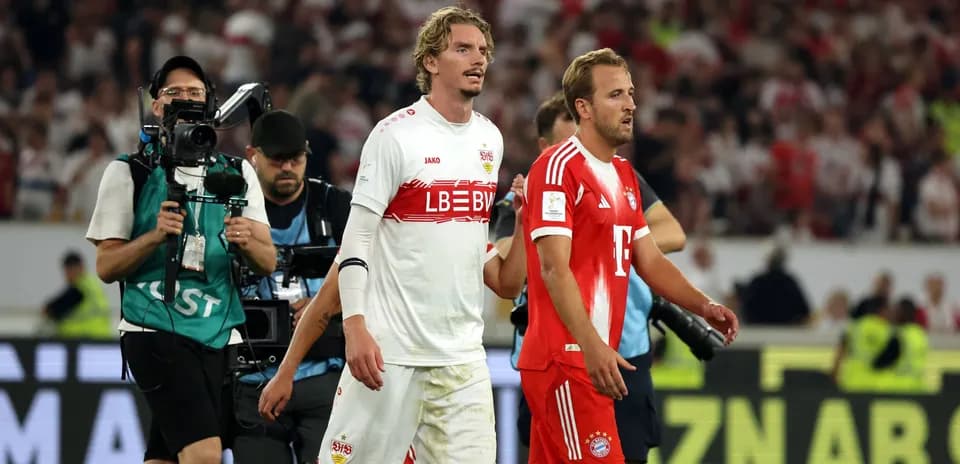 Players walking off pitch after match conclusion