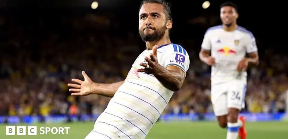 Player celebrating a goal on the pitch