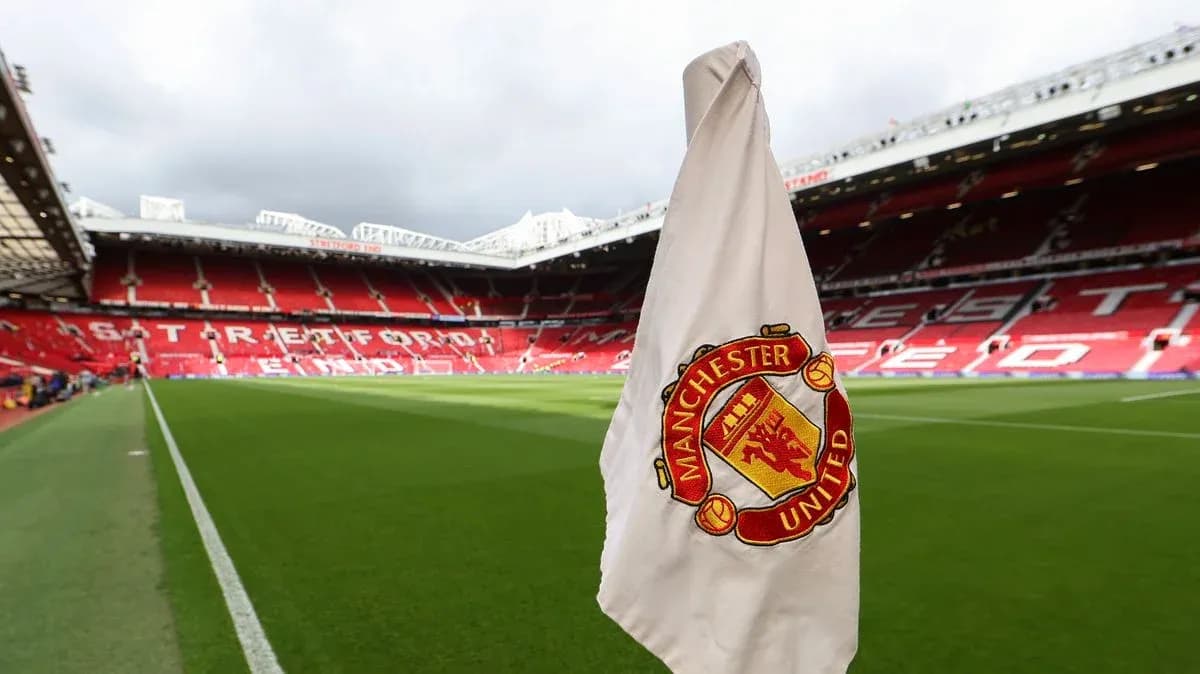 Corner flag with Manchester United logo at Old Trafford