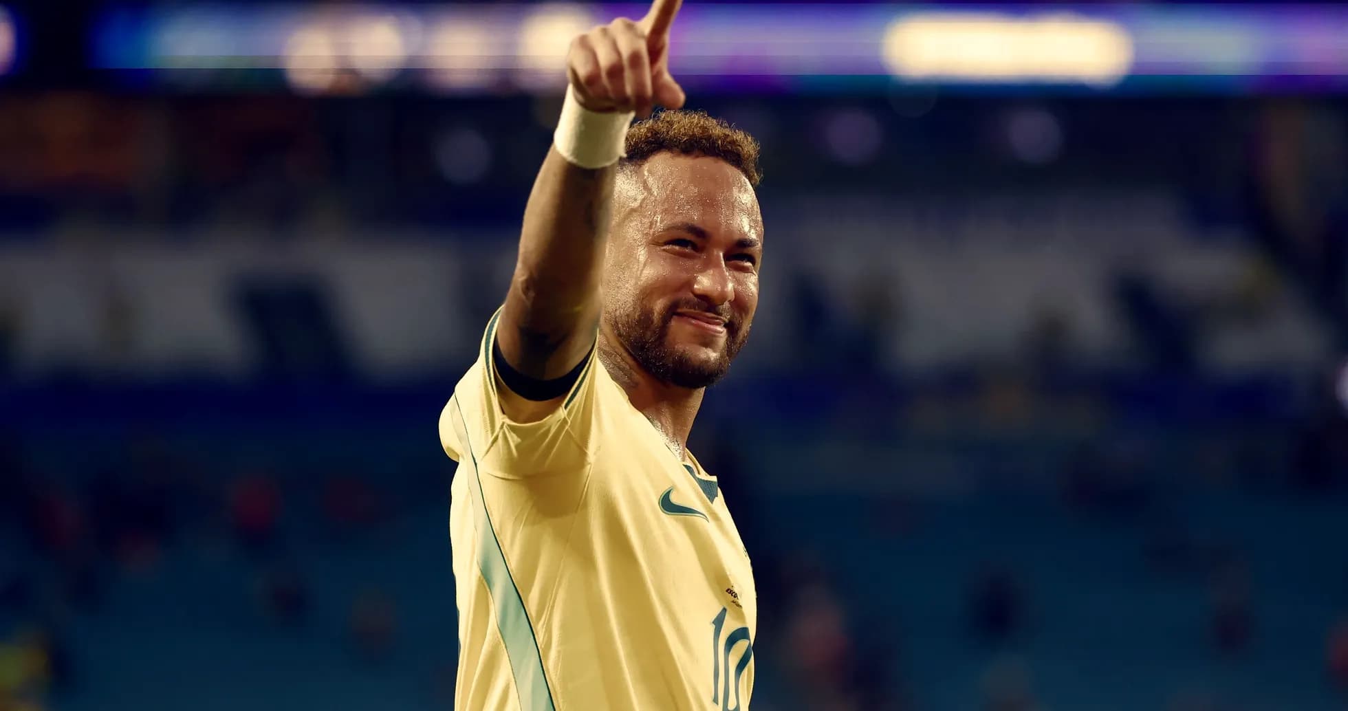 Player celebrating and pointing after match victory