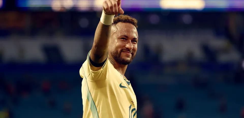 Player celebrating and pointing after match victory