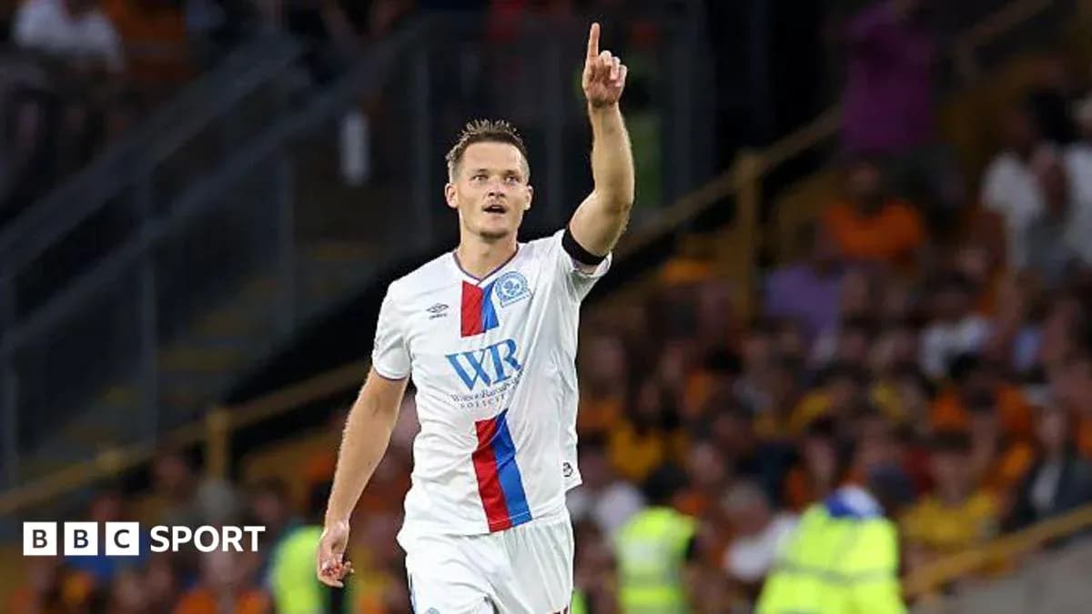 Player celebrating a goal with raised finger