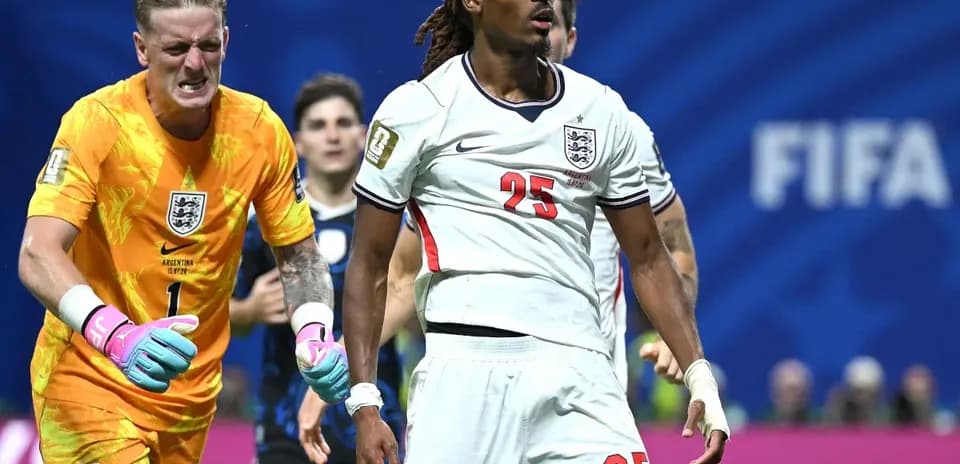 England players reacting during a tense moment