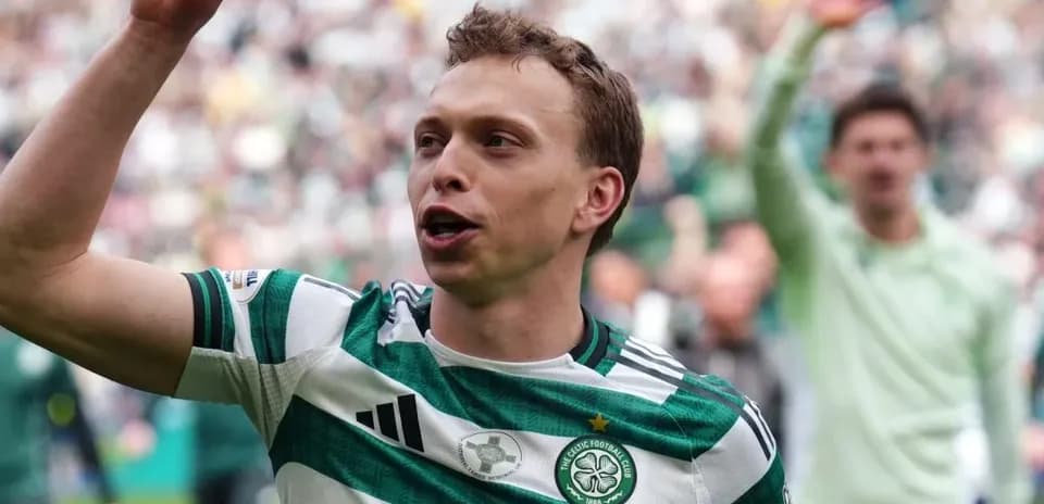 Player celebrating in Celtic Football Club jersey