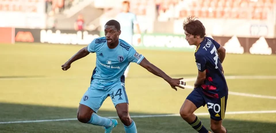 Player dribbling the ball during match action