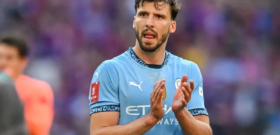 Player in light blue jersey applauding fans