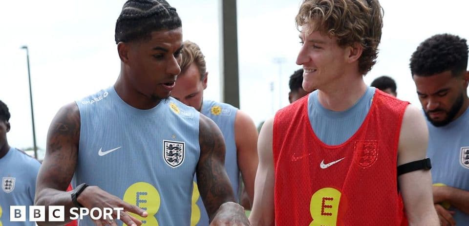 Two players discussing during England training session