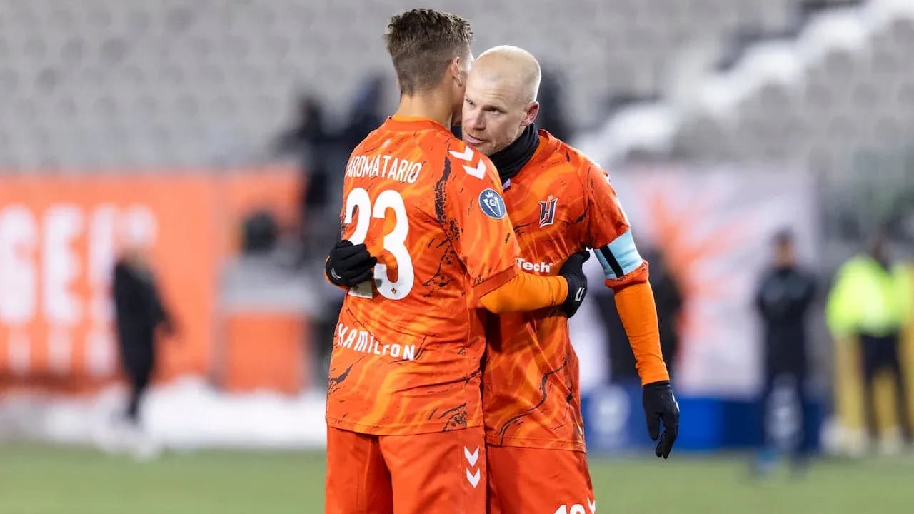 Two players embracing after a match