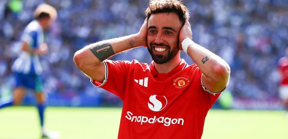 Bruno Fernandes celebrating a goal with hands on head