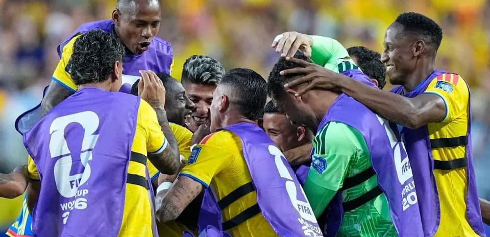Players celebrating together after scoring a goal