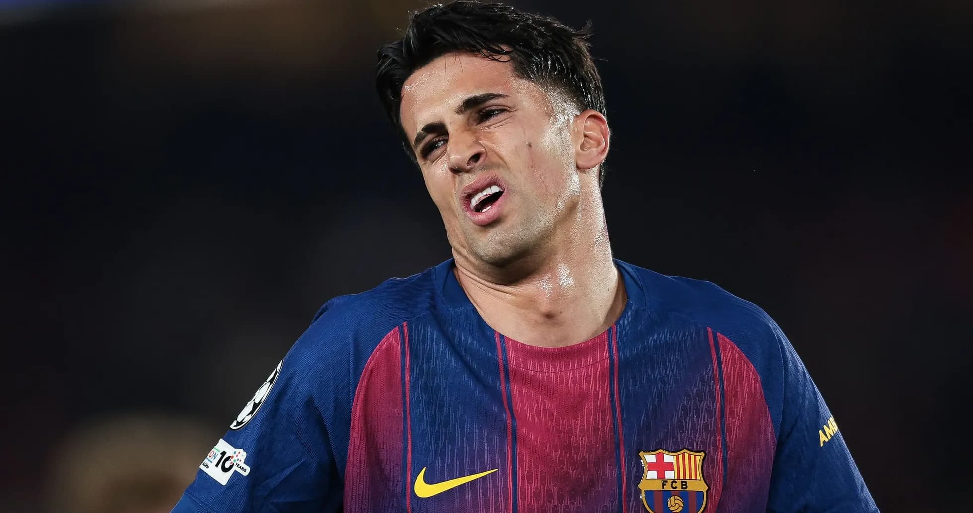 Player from FC Barcelona showing frustration during match
