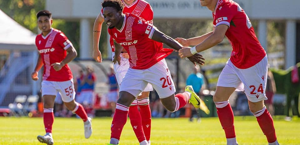 Cavalry FC players celebrating a goal