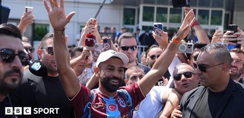 Player greeting fans upon arrival at venue