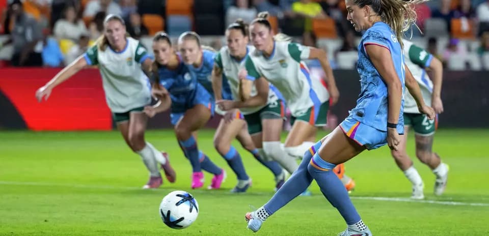 Player taking a penalty kick during match