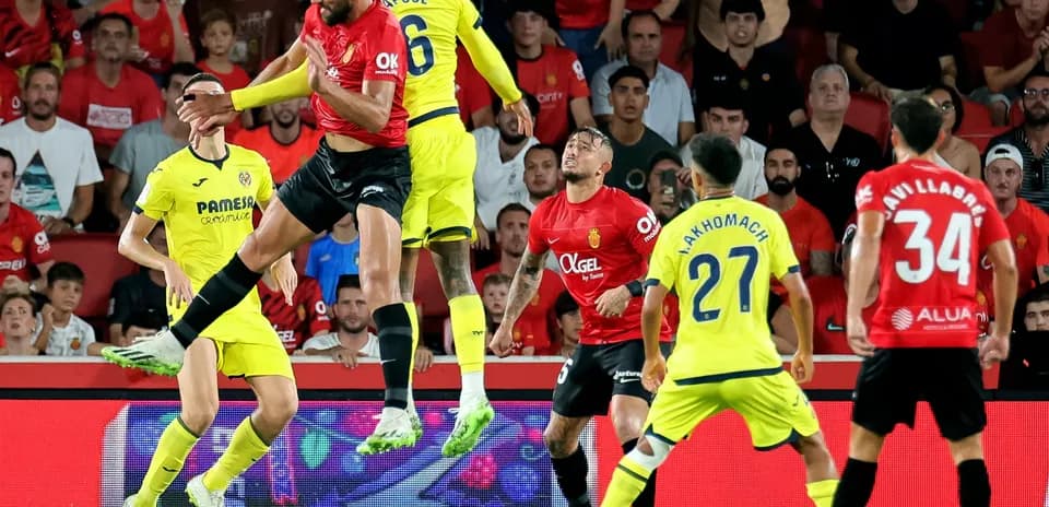 Players contesting for the ball during La Liga match