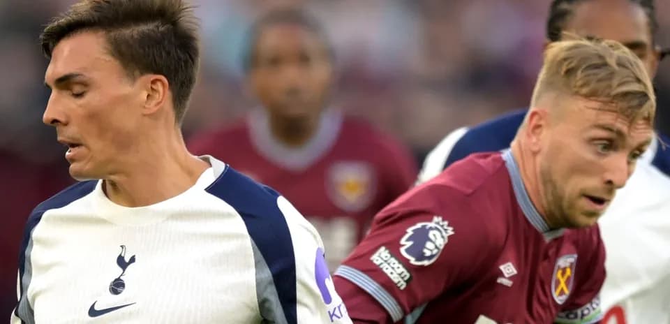 Two players from Tottenham and West Ham in action