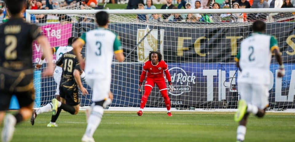 Goalkeeper ready for penalty kick during match