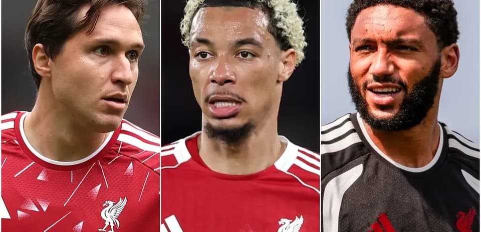 Three Liverpool players in team jerseys posing
