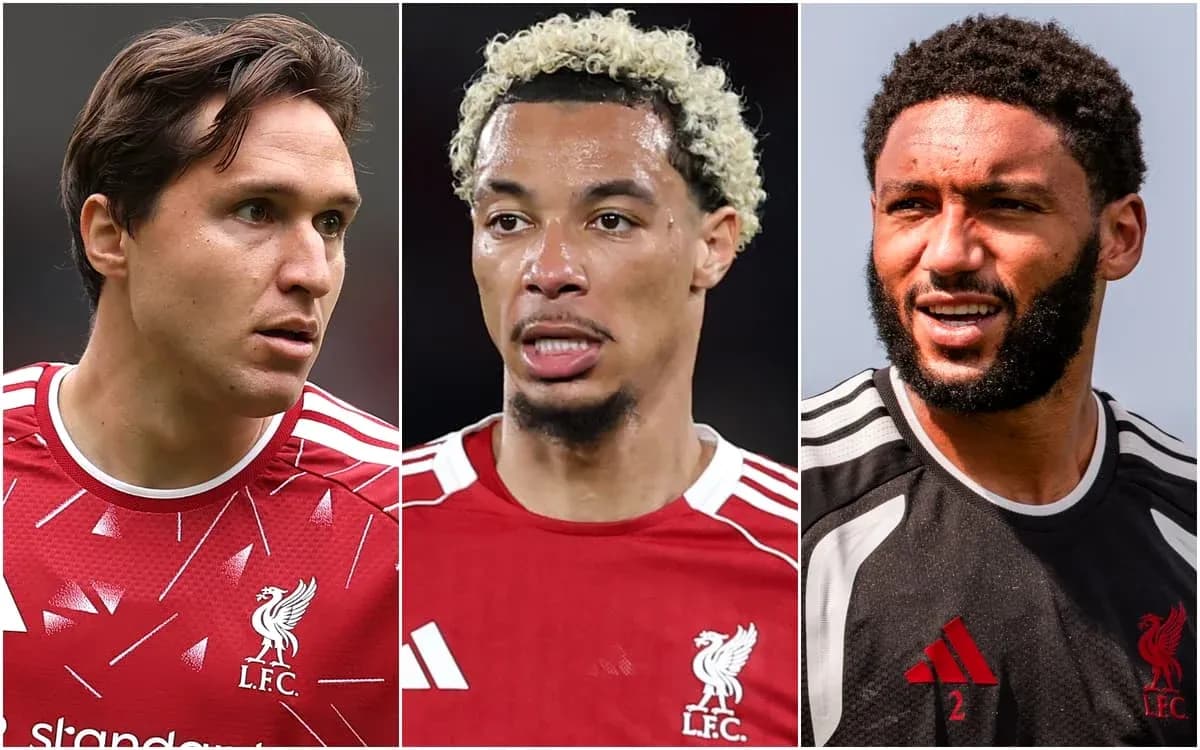 Three Liverpool players in team jerseys posing