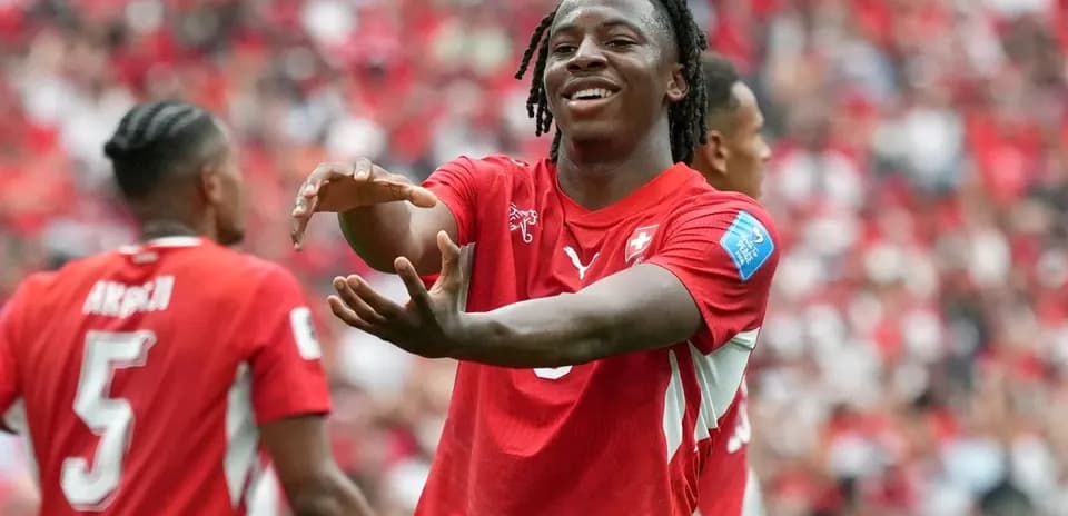 Player celebrating with teammates during match