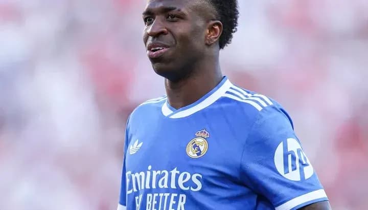 Vinícius Júnior wearing Real Madrid jersey on field