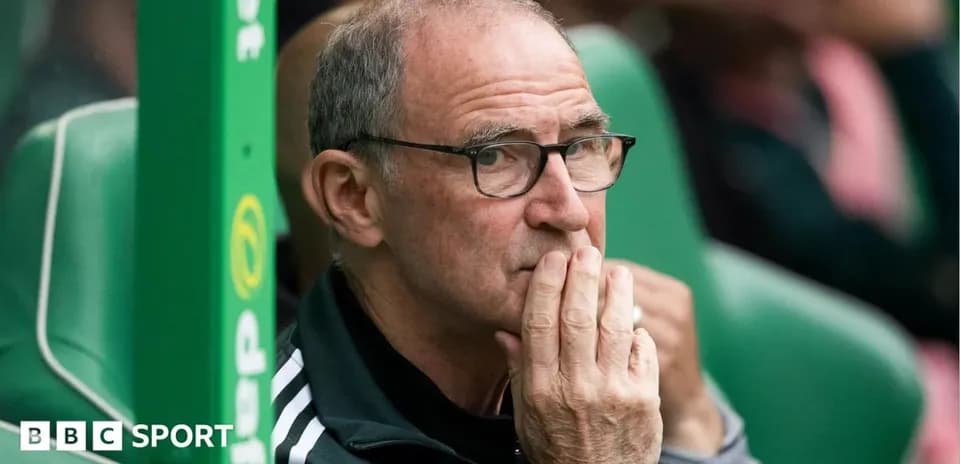 Coach observing match from the sidelines