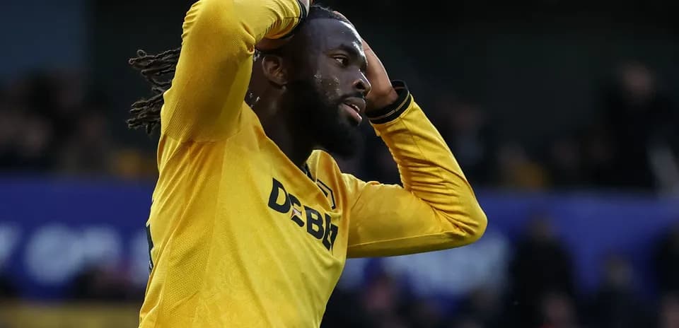 Player in yellow jersey reacting during match