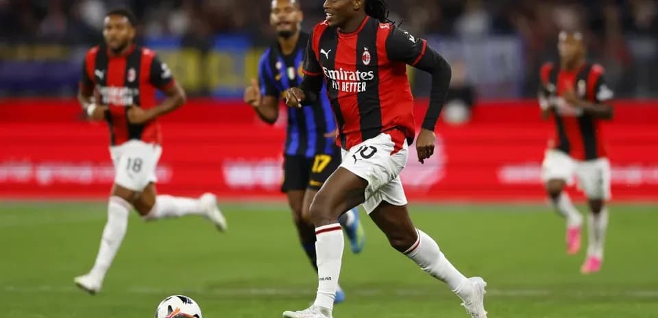 Player dribbling the ball during football match