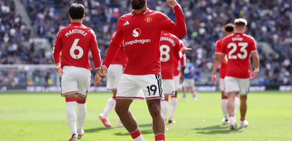 Player celebrating in Manchester United jersey during match