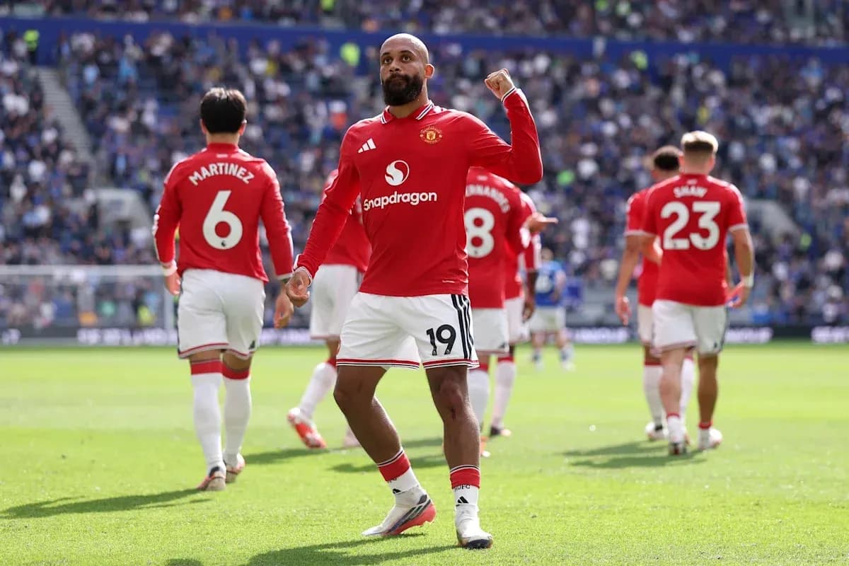 Player celebrating in Manchester United jersey during match