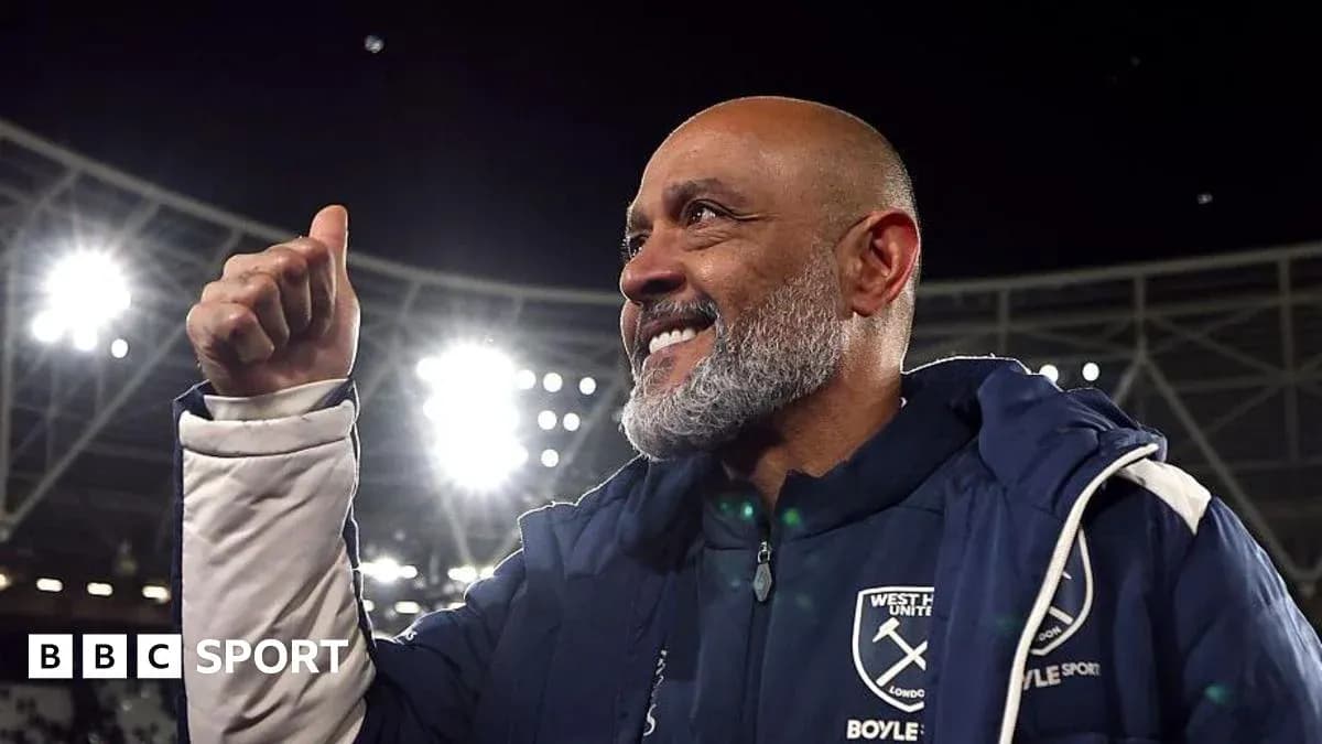 Manager celebrating with a thumbs-up gesture
