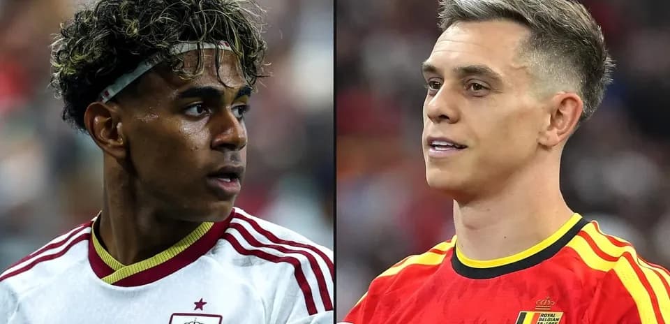 Two soccer players from Spain and Belgium during match