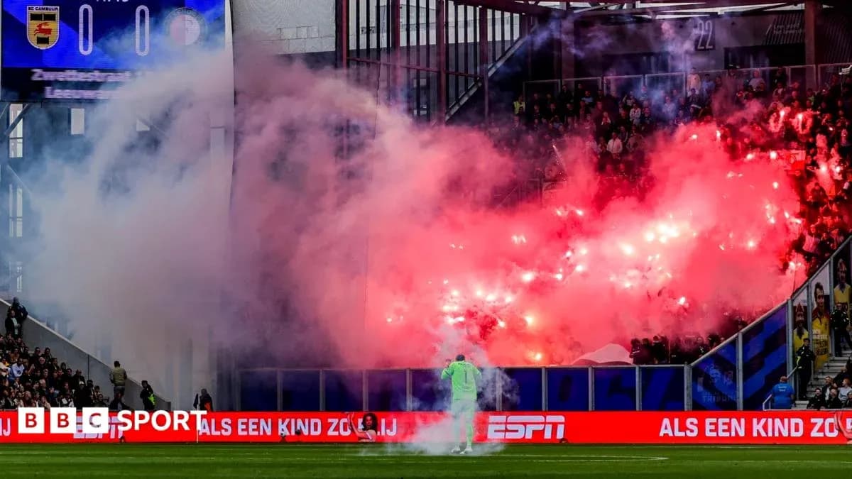 Fans celebrating with flares during a match