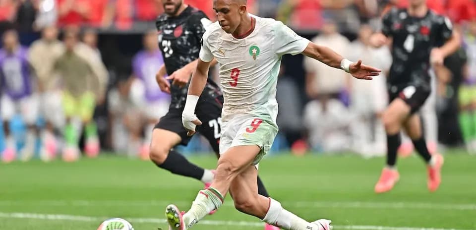 Moroccan player shooting during World Cup match
