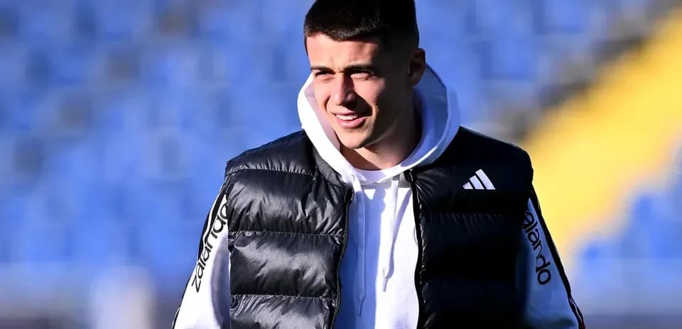 Player in puffer vest during training session